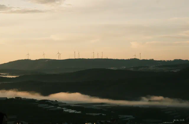 Using Bias-Corrected Reanalysis to Simulate Current and Future Wind Power Output