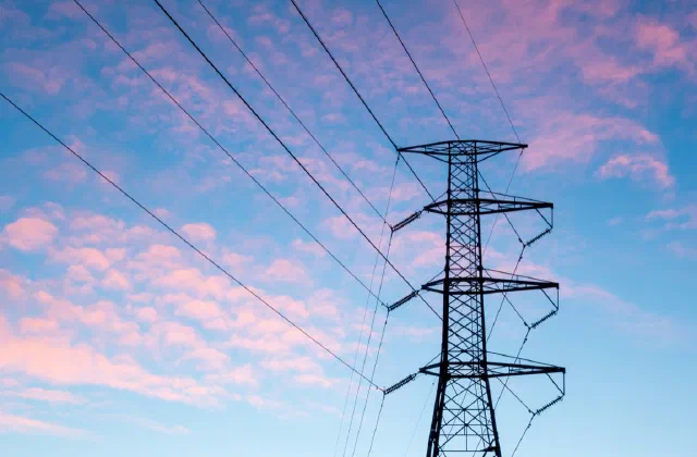 Mitigating a Century of European Renewable Variability with Transmission and Informed Siting